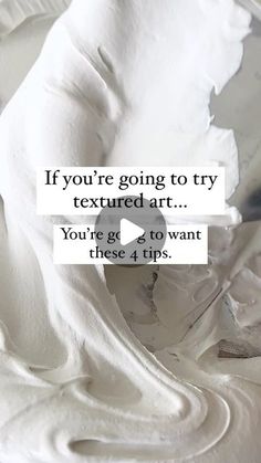 a white bowl filled with whipped cream next to a piece of paper that says, if you're going to try textured art you're 2 to want these 4 tips