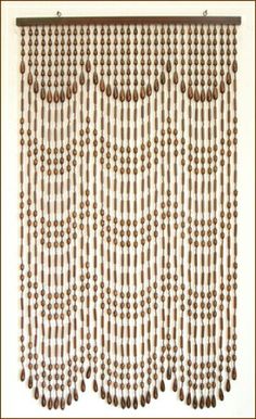 the beaded curtain is hanging in front of a white wall with wood beads on it