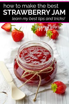 strawberry jam in a glass jar with strawberries around it and the words tips and tricks to make the most amazing strawberry jam