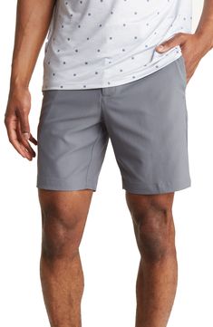 Perfect your game in flat-front golf shorts constructed from moisture-wicking performance stretch fabric for enhanced comfort. Zip fly with button closure Four-pocket style Flat front Moisture-wicking Stretch woven construction 90% polyester, 10% elasterell-p Machine wash, tumble dry Imported Model stats: 6'1" height, 32" waist. Model is wearing size 32. Sporty Golf Shorts With 4-way Stretch, Sporty 4-way Stretch Golf Shorts, Golf Bottoms With Go-dry 4-way Stretch, Golf Athletic Shorts With Built-in Liner, Moisture-wicking Golf Shorts, Cotton Golf Bottoms With Built-in Shorts, Golf Bottoms With Built-in Shorts And 4-way Stretch, Cotton Bottoms With Built-in Shorts For Golf, Golf Bottoms With Built-in Shorts In Cotton