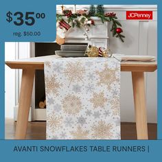 a table runner with snowflakes on it