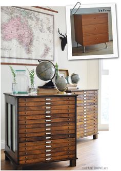 an old dresser with drawers and globes on top in front of a large map