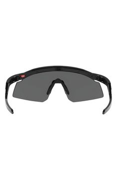 A Razor Blade-inspired, semirimless-lens shape adds surf-performance durability to these shield sunglasses accentuated by modern trigger temples. 37mm lens width; 137mm bridge width; 139mm temple length 100% UV protection Prescription-compatible Prizm lens technology enhances color, contrast and detail for an optimized visual experience Lightweight, durable BiO-Matter® frames with durable flexibility offer a balanced fit, improved comfort and head retention Propionate Made in USA Modern Rimless Shield Sunglasses For Outdoor, Black Shield Sunglasses With Tinted Lenses For Protection, Rimless Shield Sunglasses With Uva Protection For Outdoor, Rimless Shield Sunglasses With Gradient Lenses For Outdoor, Functional Matte Black Shield Sunglasses With Uva Protection, Functional Black Shield Sunglasses With Tinted Lenses, Black Rimless Shield Sunglasses For Outdoor, Matte Black Functional Shield Sunglasses With Uva Protection, Matte Black Shield Sunglasses With Uva Protection