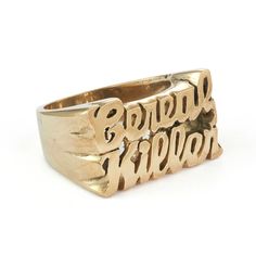 a gold ring with the word'happy friday'engraved on it, in front of a white background