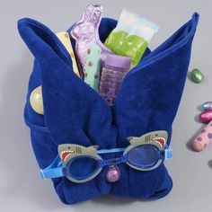 a blue bag filled with lots of toys