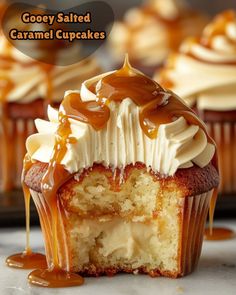 there is a cupcake with caramel icing on it