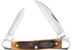 a knife that is sitting on top of a wooden block with two knives sticking out of it