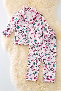 Stay comfortable and stylish while you sleep in our pajama set. Made from 95% polyester and 5% spandex, this fuchsia stripe and white character printed set offers a soft and stretchy fit. Enjoy a quality night's rest in style. Ships 3-5 business days Printed Fitted Sleepwear For Sleepover, Fitted Printed Sleepwear For Sleepover, Playful Pink Printed Sleepwear, Playful Hello Kitty Print Sleepwear For Pajama Party, Pink Printed Sleepwear, Pink Hello Kitty Print Sleep Sets, Pink Hello Kitty Sleepwear Sets, Fitted Pink Printed Sleepwear, Cute Stretch Sleepwear For Pajama Party