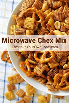 a bowl filled with chex mix on top of a table