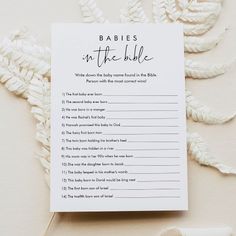 a baby shower game with the words babies on the bible written in cursive font