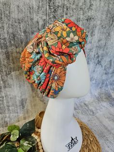 Our Retro Fall Floral Print Ruffle Front Turban is made of soft and stretchy ribbed knit for comfortable all day wear. Wrap Happy and create YOUR perfect fit with your choice of sizes and finishes. No need to wear a full scarf or hassle with complicated wrapping techniques- this fabulous look is already done for you! Get perfect styling in a flash -just pull it on and go!  Fits: Bare Fit- worn over no hair Hair Fit- worn with hair Shaper Fit- worn over shaper or volumizer. If choosing Shaper Fit, please measure your head with shaper ON for the best fit. See Measuring Pic. Styles: Cinch Front Ruffle Front Available in:  21.5"  22.5" 23.5" Custom If you need a size different from those listed, please choose "Custom", and leave a note at checkout.  Measure from your forehead around to the bas Turban For Women, Wrapping Techniques, Head Covering, Fall Floral, Top Knot, Workout Wear, For Hair, Rib Knit, Ribbed Knit