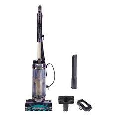 a close up of a vacuum on a white background with other items around the room