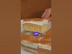 two pieces of cake sitting on top of a white plate with the word uf