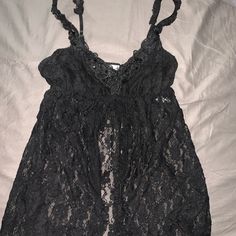 Black Lace With Sequin Trim V Neck, Open Mid Section. New, Never Worn, No Tags. Black Sleep Top With Built-in Bra, Black Stretch Sleepwear, Fitted Black Top For Sleep, Black V-neck Stretch Sleepwear, Black Lace Summer Sleepwear, Black Lace Sleepwear For Summer, Black Stretch Sleepwear For Bedtime, Black Sleeveless Sleepwear, Black Camisole Nightgown