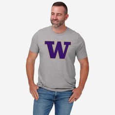 While the team racks up victories during the game, you can rack up the style points everywhere you go. All you need is this Washington Huskies Primary Logo T-Shirt. Look good, feel good, and get ready to let everyone know that you’re the MVP of fan fashion. This top features a design that showcases your all-important team colors and a bold team logo display across the chest, meaning this tshirt will prove your unmatched dedication to the Washington Huskies when you’re at the game or watching at Husky Colors, Can Rack, Fan Fashion, Washington Huskies, Logo Display, Look Good Feel Good, Team T Shirts, Heather White, Team Shirts