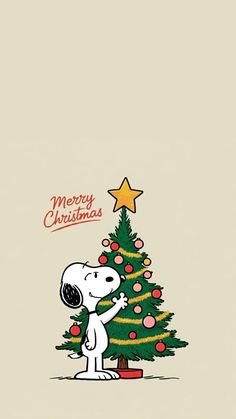 a christmas tree with a snoopy character on it and the words merry christmas written in red