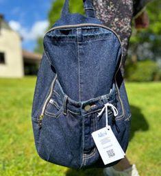 Lightweight, roomy, comfortable unique backpack. Large number of functional external pockets. Internal and secret pockets. Perfect as a weekend backpack, suitable for family picnics, short nature hikes with friends, and for individual relaxation when you just want to read a book in the park or retire to the rising sun in an assan.  Raw/Materials: upcycled jeans, upcycled shirt - lining, upcycled padding jacket - back, bottom and backstraps  WE WOULD LIKE TO MAKE THIS BAG OUT OF YOUR JEANS  WE ACCEPT CUSTOM ORDERS Travel Backpack With Pockets In Denim, Denim Travel Backpack With Pockets, Denim Blue Backpack With Pockets For Everyday Use, Denim Backpack With Pockets For Everyday Use, Denim Backpack With Pockets, Standard Denim Backpack With Pockets, Study Bag, Weekend Backpack, Upcycled Shirt