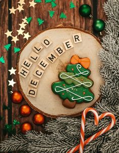 a christmas cookie with the word december spelled on it