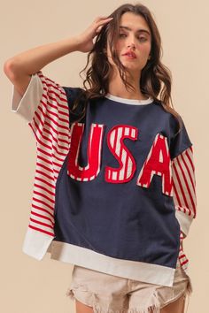 The USA Letter Patchwork Contrast Short Sleeve T-Shirt is a trendy and patriotic piece that celebrates American pride. Featuring patchwork details with USA lettering, this t-shirt exudes a bold and American-inspired vibe. The contrast design adds a modern and eye-catching element to the top, making it stand out. Pair this t-shirt with denim shorts for a casual summer look or dress it up with a skirt for a fun and patriotic outfit. The combination of patchwork and lettering creates a unique and stylish appeal that showcases your love for the USA. Show off your patriotic spirit in style with the USA Letter Patchwork Contrast Short Sleeve T-Shirt that offers a chic and fashionable way to represent your American pride. Features: Slit, High-Low, Exposed seam Sheer: Opaque Stretch: No stretch Ma Contrast Design, Patchwork Shorts, Patriotic Outfit, Top Graphic Tees, American Pride, Jumpsuit Shorts Rompers, Summer Look, Red Coral, Cardigan Jacket