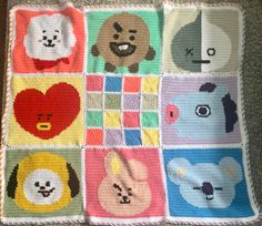 a crocheted blanket with many different animals on it