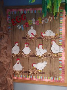 a bulletin board with chickens and roosters on it