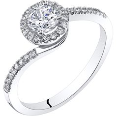 a white gold engagement ring with diamonds on it