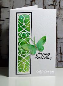 a birthday card with a green butterfly on it