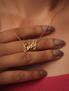 Imagine a necklace that speaks volumes about your love and devotion. Our personalized 14K gold name necklace is more than just an accessory; it's a timeless piece of jewelry that symbolizes your enduring bond. With its elegant design and customizable name, this necklace is a perfect way to express your deep affection and create a lasting memory. Features and Benefits: ✅ Personalized design with your chosen name ✅ Crafted from high-quality 14K gold for durability and shine ✅ Elegant and timeless design ✅ Adjustable chain for a perfect fit ✅ Comes in a beautiful gift box, making it ideal for special occasions ✨-- M A T E R I A L S & F I N I S H --✨ ✅ Crafted from high-quality 925 sterling silver with a 14k gold micron plating or in solid 14k gold. ✅ Available in Rose Gold, White Gold, and Ye Personalized Name Pendant Necklace, Customizable Gold Necklaces For Personalized Gifts, Custom Name Pendant Necklace, Customizable Gold Necklace For Personalized Gift, Nameplate Necklace For Anniversary, Nameplate Necklace For Anniversary Gift, Personalized Gold Necklaces With Names, Personalized Name Gold Necklaces, Customized Gold Charm Necklace With Heart Pendant