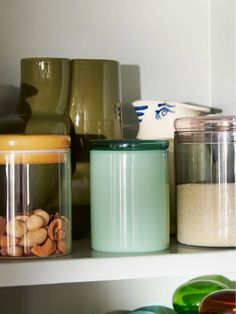 jars and containers are sitting on the shelf