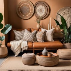 a living room filled with lots of different types of pillows and vases on the floor