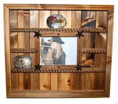 a wooden photo frame with cowboy hats and stars on the front, along with other items