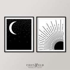 two black and white art prints with the sun, moon and stars in them on a wall