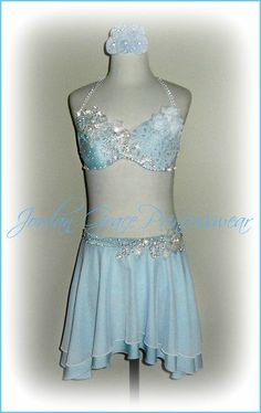 a blue and white dress with sequins on it