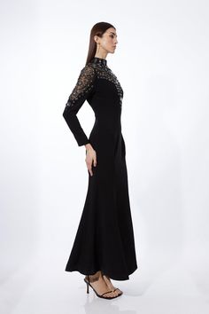 {@@=Ist.Core.Helpers.StringHelper.ToProperCase("Exude a glamorous edge with this maxi dress, adorned with premium crystal embellishments along a sheer high neck and long sleeves, while a sweetheart neckline adds an alluring touch. Cut with an A-line lightly pleated finish for a flattering silhouette, pair with barely-there heels and silver-tone accessories for a formal soirée ensemble.Crystal embellishmentsLong sleevesHigh neckExpertly designed for those 5'3" and under, our Petite pieces are per