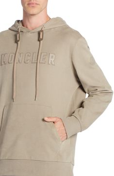 The label known for its impeccable outerwear adopts a more-lightweight approach with an all-cotton hoodie finished with a leather logo stitched to the chest. Drawstring hood Kangaroo pocket Ribbed cuffs and hem 100% cotton with leather contrast Dry clean Imported Designer Clothing Hood Clothes, Applique Hoodie, Applique Sweatshirt, Moncler Logo, Leather Logo, Cotton Hoodie, White Hoodie, Grey Hoodie, White Sweatshirt