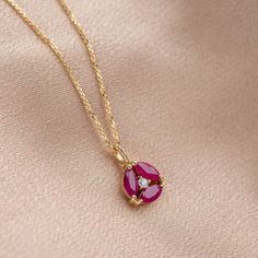 Ruby Diamond Flower Necklace 14K Gold - Natural Genuine Ruby Gemstone Cluster Pendant Solid Gold - Christmas Gift for Her D E T A I L S ● Metal: 14K solid gold, 14K white gold or 14K rose gold ● Gemstones: Ruby Marquise cut, Diamond Brilliant cut ● Gemstones Weight: Ruby 0.79 ct, Diamond 0.03 ct ● Length: sold as pendant or with chain 17.5 inches (45 cm) H O W ∙ T O ∙ O R D E R Choose from the drop-down menu the available options (Metal, Style) and leave us a note for any special requirements. G Diamond Flower Necklace, Ruby Diamond Pendant, Gold Amethyst Ring, Gold Heart Ring, Natural Gemstone Necklace, Ruby Pendant, Gold Fashion Necklace, Ruby Necklace, Garnet Jewelry