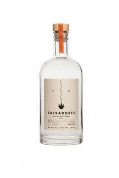 a bottle of sauvadores gin on a white background