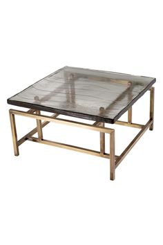 a glass and metal coffee table with two square tables on each side, in front of a white background