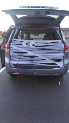 the back end of a car that has been decorated to look like a cartoon character