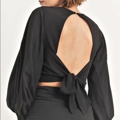 Reset By Jame Open Back Long Sleeve Top With Center Back Tie And Deep Vneck Detailing! New With Tags. Chic Tie Back Crop Top For Date Night, Elegant Black Top With Tie Back, Black Tie-back Evening Top, Black Tie Back Top For Evening, Chic Cropped Blouse With Tie Back, Black Tie Back Top For Date Night, Chic Tie-back Top For Night Out, Black Tie Back Top For Party, Chic Long Sleeve Blouse With Tie Back