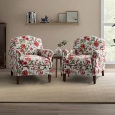 a living room with two chairs and a coffee table