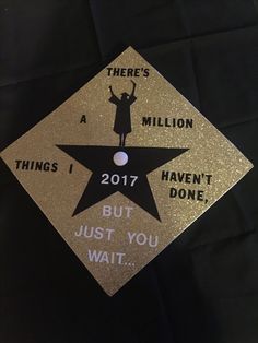 a graduation cap with the words, there's a million but just you wait