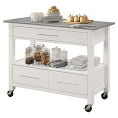 a white kitchen cart with food and drinks on it