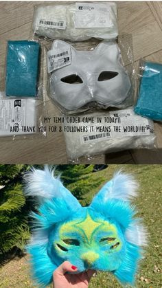 two masks with blue and green hair, one in the shape of a cat's head