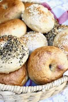 a basket filled with bagels covered in sprinkles on top of a table