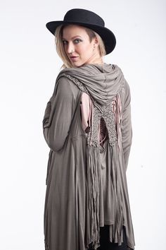 This fun, elegant, bohemian style cardigan has many hand-macrame details. There are fringe macrame at the hem, and original hand-macrame detail at the back. All macrame are hand-crafted by one worker, who I trained to do this macrame. Ethically made in small batches, fair trade sustainable clothing. Items are ready to ship from San Francisco, California. Sizes: all one size Colors: Black, Ash, Teal Bohemian Hooded Cardigan For Spring, Spring Bohemian Hooded Cardigan, Bohemian Hooded Outerwear For Spring, Bohemian Hooded Cardigan For Fall, Bohemian Hooded Spring Outerwear, Bohemian Long Sleeve Cardigan For Festivals, Bohemian Fall Cardigan, Bohemian Fall Festival Cardigan, Bohemian Spring Festival Cardigan