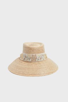 Sarah Bray Bermuda creates sustainable, biodegradable sun hats in an an effort to stop adding non-essential waste to our beautiful world.A Tuckernuck exclusive, the Ivory Jacquard Wildflower Hat is a retro-style hat (that fits big and bucket-y) that will be your new everyday styling piece! Made from biodegradable palm tree leaves, this throw-on-and-go style features brass circles so you can easily interchange ribbons or even silk scarves that you may already own. From relaxing beachside to hosting backyard get togethers, this outfit finisher is sure to keep you shaded and looking fresh. Palm tree weave White grosgrain ribbon  Short brimmed Material: Palm Tree Leaves, Grosgrain Ribbon Care: If your hat is in need of reshaping, use a household steamer to mold the brim and crown into your des Palm Tree Leaves, Be Natural, Greek Sandals, Tree Leaves, Kids Sale, Weekend Wear, Silk Scarves, Grosgrain Ribbon, Beautiful World