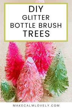 three small christmas trees with the words diy glitter bottle brush trees