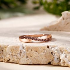 Simple in design, the ring is finished with a bright polished shine. Celebrate your commitment with this meaningful wedding band.Carat Weight: 0.29 ctStone Size: 1 mmStone Type: Jeulia® StoneNumber of Stones: 29 Stone Shape: RoundStone Color: ChocolateWeight: 2.7 gWidth: 2.1 mmHeight: 2.3 mmThickness: 1.2 mmMaterial: Plating Color: Rose Gold Diamond Couple Rings For Promise, Anniversary Rose Gold Diamond Birthstone Ring, Rose Gold Round Band Birthstone Anniversary Ring, Anniversary Birthstone Ring In Rose Gold With Diamond Accents, Rose Gold Cubic Zirconia Birthstone Promise Ring, Rose Gold Birthstone Ring For Anniversary, Promise Rose Gold Birthstone Ring With Cubic Zirconia, Anniversary Rose Gold Birthstone Ring With Diamond Accents, Rose Gold Birthstone Anniversary Ring