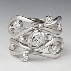 a white gold ring with diamonds on it